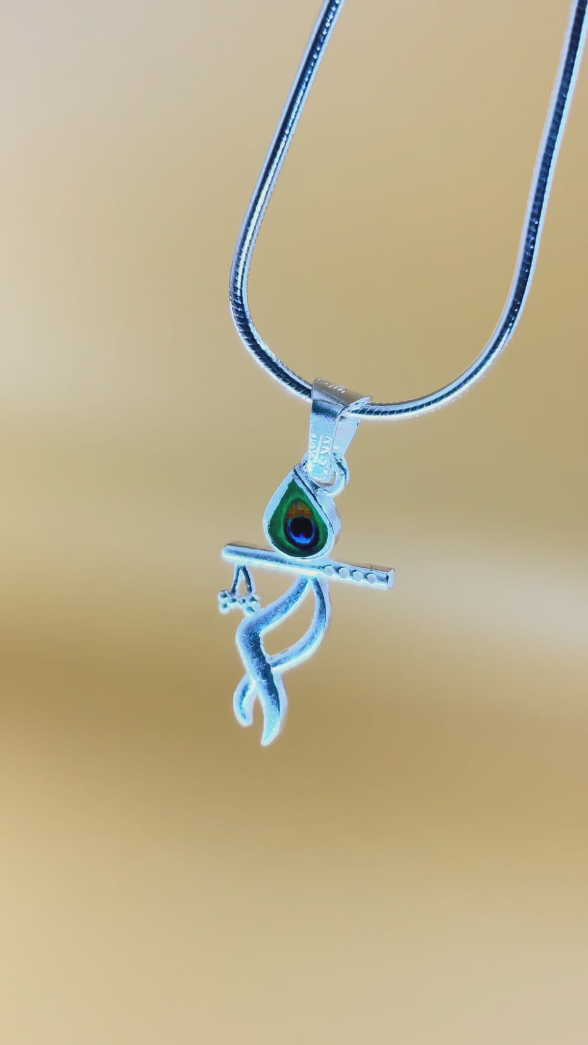 The Flute & Feather Pendant